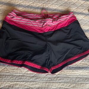 Women's Black and Pink Athletic Shorts. Lululemon size 8